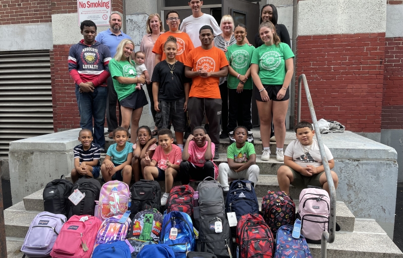 Condon Community Center with their backpacks