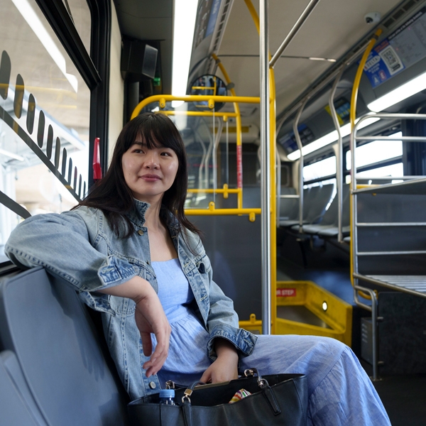 Woman riding the bus