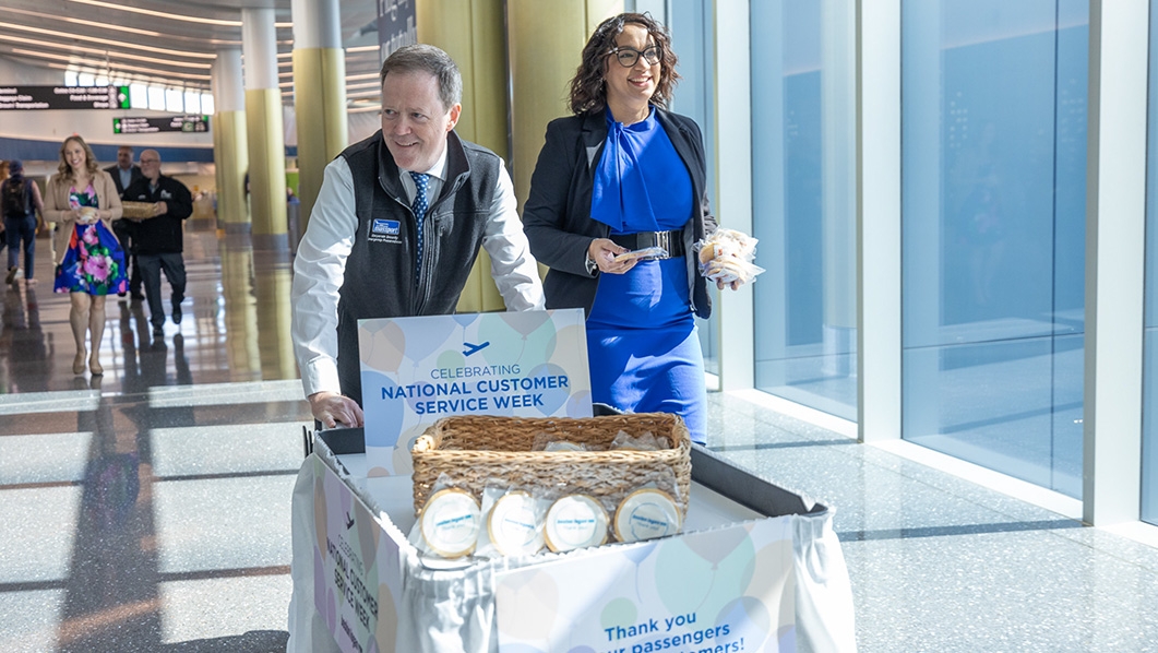 Rich Davey and Customer Service Team handing out cookies