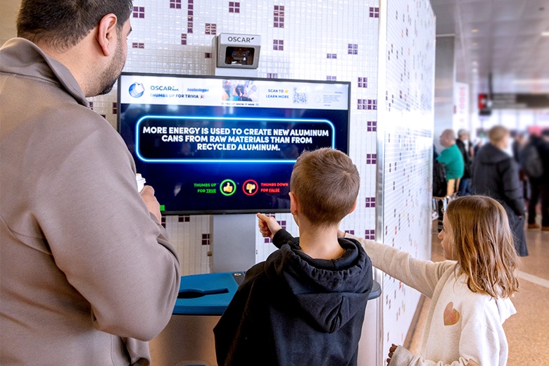 Passengers at Boston Logan using Oscar to recycle