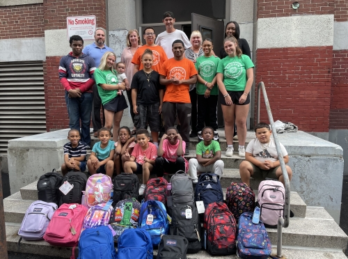 Condon Community Center with their backpacks